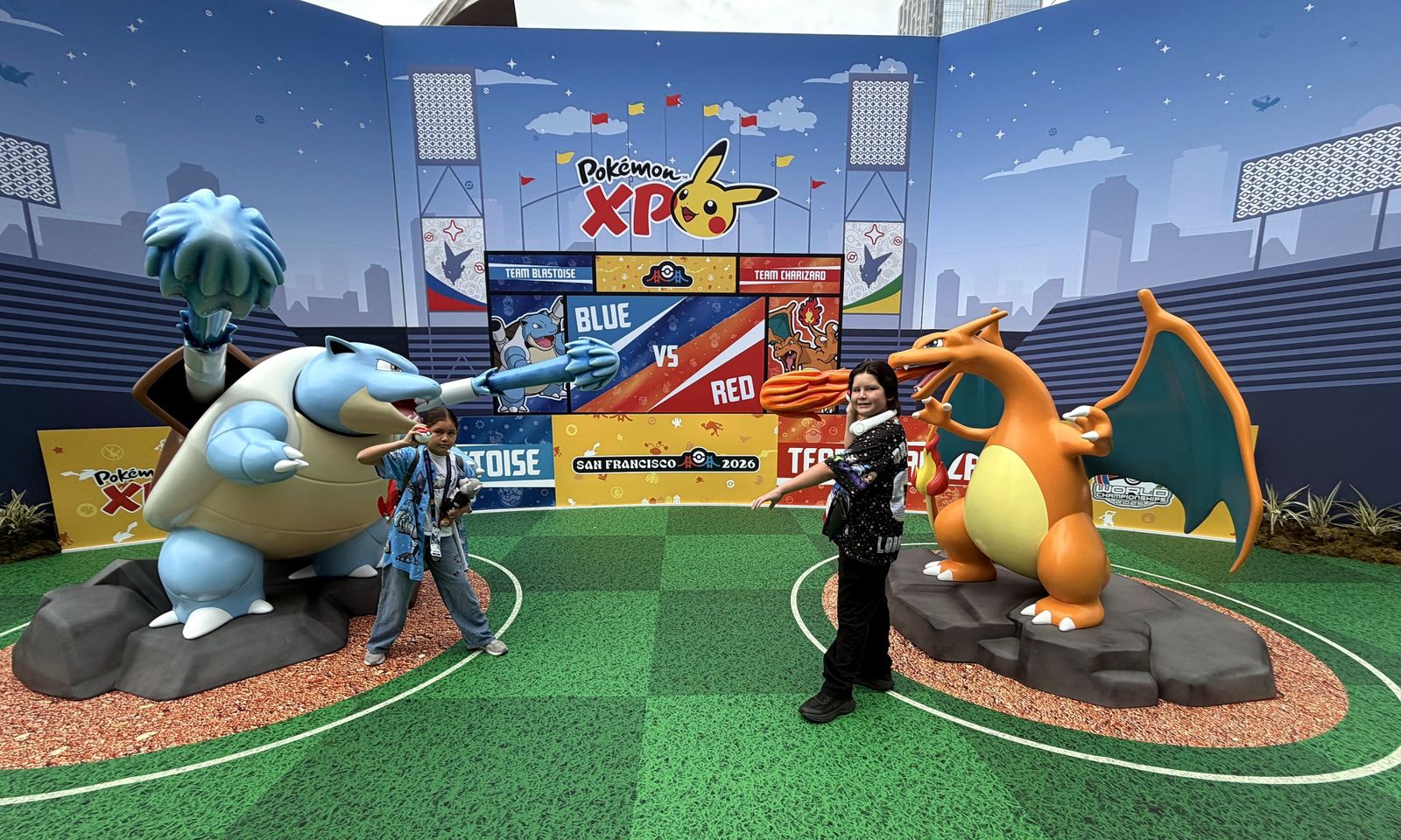 The team at the Blue vs Red stage at Pokémon XP